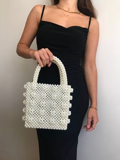 White Clutch Box Bag With Top Carry Handle, White Rectangular Evening Bag With Top Carry Handle, White Handheld Bag With Pearl Handle, Pearl White Bag With Pearl Handle, Pearl White Rectangular Bag With Pearl Handle, Pearl White Bag With Pearl Handle Rectangular, White Tote Bag With Pearl Handle, White Tote Shoulder Bag For Wedding, White Rectangular Bag With Pearl Handle