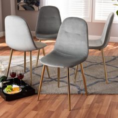 Baxton Studio Elyse Glam and Luxe Grey Velvet Fabric Upholstered Gold Finished 4-Piece Metal Dining Chair Set FredCo Grey Upholstered Dining Chairs, Metal Dining Chair, Dining Chair Upholstery, Gray Dining Chairs, 4 Dining Chairs, Grey Dining, Metal Dining Chairs, Baxton Studio, Upholstered Fabric