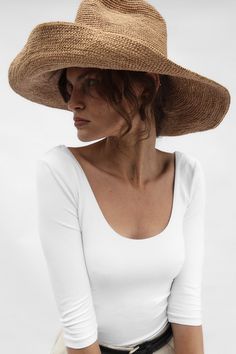 DETAILS Waverly, a wide-brimmed hat, is expertly crafted from durable, packable raffia straw. Its wire-infused brim and crown offer structural flexibility, allowing you to customize the shape effortlessly.· Brim: 5.5"· Crown: 4.25"· Shapeable Wired Brim and Crown · Comes in Black· UPF 35+ FIT Runs true to size. If between sizes, we suggest sizing up. Summer Hat Style, Raffia Sun Hat, Packable Hat, Summer Playlist, Raffia Hat, Janessa Leone, Travel Hat, Straw Fedora, Gold Monogram