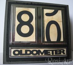 an old time clock with the number eighty eight on it's face and black numbers