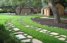 there is a stone path in the yard