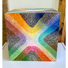 a colorful box sitting on top of a table