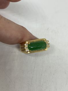 Vintage Lucky Green Nephrite Jade ring Large green nephrite jade Ornate gold finished White bronze Vintage ring, does not tarnish, NOT sterling Size 8, 9 or 10. My jeweler can custom re size for a $10-$20 fee All rings are shipped free in the US in a nice gift box. Check out our over a THOUSAND great reviews Engraving is $4 per letter and is not always perfect depending on the piece. It can take a few days if the jeweler is busy. This is payable to Paypal Judithsltd@gmail.com Vintage Jade Ring, Gold Rectangular Emerald Ring For May Birthstone, Appearance Tips, Vintage Inspired Engagement Rings, Lucky Green, Ringe Gold, Golden Ring, Nephrite Jade, Jade Ring