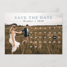 a calendar photo save the date postcard with an image of a couple holding hands