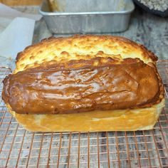 a loaf of bread sitting on top of a cooling rack