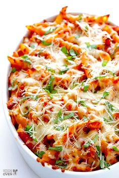 a casserole dish filled with pasta and cheese