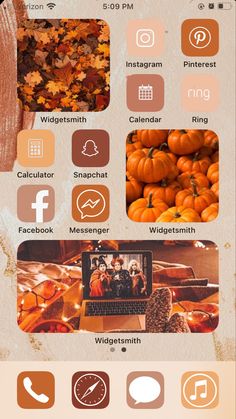 an iphone screen showing the home screen and icons for fall, with pumpkins in the background