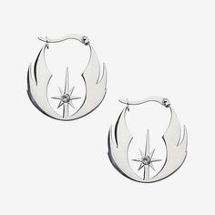 pair of earrings with star design on the front and back, in white gold plated metal