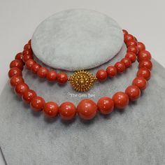 DESCRIPTION: Thank you for coming in! Spectacular 18K solid gold necklace with Mediterranean Sardinia Coral sphere beads, no dye, 100% natural tomato red color. 9.5mm-17.15mm large coral beads, 128 grams with a beautiful 18k solid gold clasp~Our favorite color for coral! The beads are premium quality, you do not find hairline cracks which are common with Mediterranean coral beads. Accompanied with GIA report number 2191866911 to assure your investment! You'll get the necklace you see! SIZE of co Elegant Red Coral Round Bead Necklace, Elegant Red Coral Round Bead Necklaces, Luxury Red Coral Necklaces, Luxury Red Coral Necklace, Formal Single Strand Red Coral Necklace, Elegant Red Coral Necklace For Formal Occasions, Elegant Red Coral Necklace For Formal Events, Gold Necklace With Polished Red Coral Beads, Elegant Red Coral Jewelry With 8mm Beads