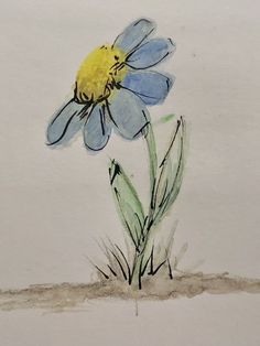 a drawing of a blue flower on a white paper with green stems and yellow center