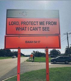 a red sign that says, lord protect me from what i can't see