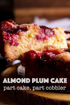 a close up of a piece of cake on a plate with the words almond plum cake part, part cobbler