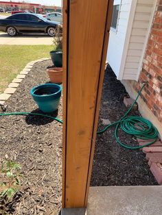 a hose is connected to the side of a house