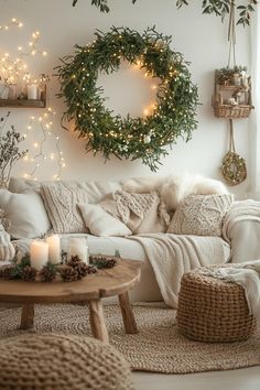 a living room filled with lots of furniture and christmas lights hanging from the wall above