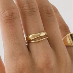 Two bands, cast from hand-sculpted wax models in the “Squiggle” silhouette, are perfectly made to stack with each-other or worn separately. Crafted to be enjoyed and admired, these two-tone rings will bring an artful and unique touch to any outfit. High polished to a high gloss in this bold, elegant ring. Wear it all day in anticipation of an evening out; it will not go unnoticed. Materials: Silver: Stainless Steel. Gold: 18K Gold Vermeil Stainless Steel 100% Eco-Friendly; No Nickel, Chromium an Solid Gold Rings With Diamond, Womens Elegant Rings, Knuckle Rings Gold Simple, Genuine Gold Ring, Gold Colour Ring, Plain Solid Gold Ring, Attic Gold Ring, Rings For Tiny Hands, 8mm Gold Band Ring