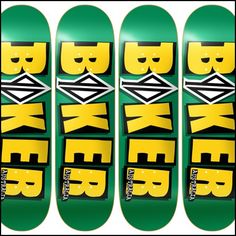 four skateboards with lego face stickers on the front and back of each board