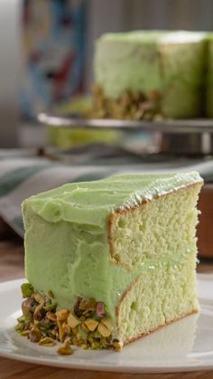 a piece of cake sitting on top of a plate next to another slice of cake