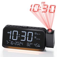 an alarm clock with red laser lights on it's display and the time displayed