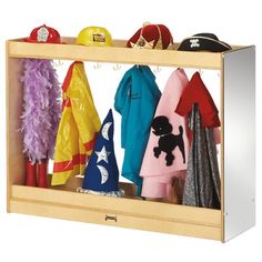 a wooden coat rack with hats and coats on it