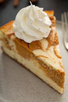 a piece of pie with whipped cream on top