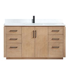 a bathroom vanity with white counter top and wooden cabinet doors on both sides, black faucet