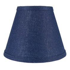 a blue lampshade on a white background, with the bottom half covered in fabric