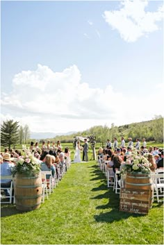 a wedding ceremony in the middle of an open field