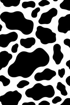 a black and white cow print pattern that is very similar to the animal's fur