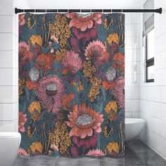 the shower curtain is decorated with colorful flowers