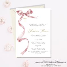 a white and pink wedding card with a cross on it