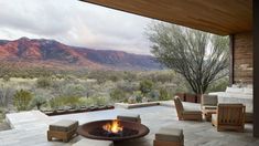 a fire pit sitting on top of a stone patio