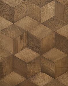 an image of wood flooring that looks like hexagons or cubes