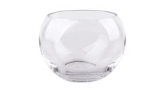 a clear glass vase sitting on top of a white table