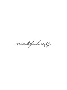 the word mindfulness is written in cursive writing