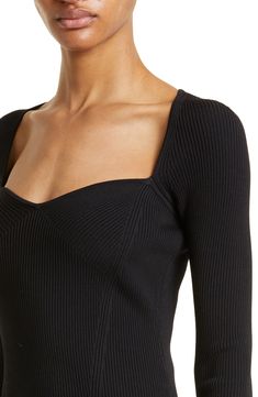 Soft ribbing shapes this day-to-night top knit with a dipped sweetheart neck. 19 1/2" length (size Medium) Sweetheart neck Long sleeves 80% rayon, 20% nylon Dry clean or hand wash, dry flat Imported Chic Fitted Knit Top With Scoop Neck, Fine Knit Fitted Party Top, Elegant Square Neck Ribbed Top, Elegant Ribbed Square Neck Top, Elegant Seamless Knit Top, Elegant Ribbed Tops For Evening, Elegant Ribbed Evening Tops, Elegant Evening Ribbed Tops, Fitted Seamless V-neck Knit Top