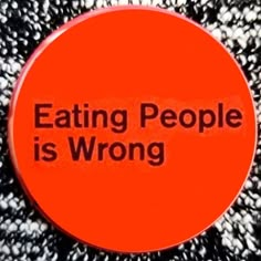 an orange button that says eating people is wrong