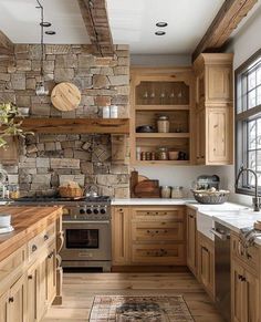 a kitchen filled with wooden cabinets and lots of counter space next to a stove top oven