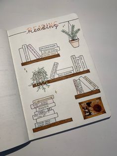 an open book with drawings and pictures on the pages that are attached to bookshelves