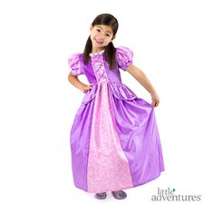 Your little princess can let their hair down in this gorgeous, comfortable Rapunzel princess dress. This adorable dress is the perfect addition to your little princess's magical costume wardrobe. The dress begins with a super-soft crushed velvet bodice, puffy princess sleeves, and eye-catching pink and purple trims. The skirt is not only comfortable and non-itchy, but features a gorgeous leaf pattern that ties the whole outfit together. Princess Costumes Kids, Rapunzel Purple, Accessories Matching, Rapunzel Princess, Rapunzel Costume, Rapunzel Dress, Princess Dress Kids, Princess Sleeves, Princess Dress Up