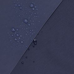 drops of water on the surface of an umbrella