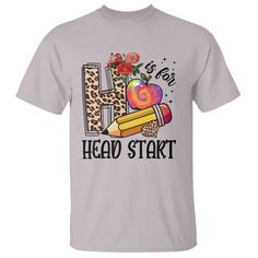 a t - shirt that says it's too head start with pencils and an apple