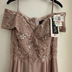 The Brand Of This Dress Is Xscape And Its Condition Is Brand New. The Color Is Warm Taupe And Its Top Includes Embroidered Sequins. The Size Is 8 Petite/Regular. Price: $225 (Negotiable) Xscape Dress, Coktail Dress, Navy Formal Dress, Black Formal Gown, Purple Bodycon Dresses, Xscape Dresses, Beautiful Evening Dresses, Warm Taupe, Pleated Skirt Dress