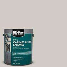 a brown paint can with the words behr premium on it and an image of a cabinet