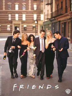 a group of people standing next to each other in front of a sign that says friends