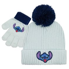 a white hat and glove set with stitching on the front, blue pom - pom