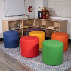 children's playroom with various colored stools and tables