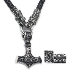 PRICES MAY VARY. PREMIUM STAINLESS STEEL: GUNGNEER proudly provides our customers with the Viking jewelry made from the best quality Stainless Steel. We put passion and efforts for each Viking jewelry producing the best experiences possible for our customers. EXCLUSIVE VIKING DESIGN: Dangling below the Wolf Head leather chain is the Mjolnir pendant screaming with timeless appeal capturing attention from all around. Mammen style carved on hammer adds eye-catching sparkle to any ensemble of yours. Mjolnir Necklace, Brown Wolf, Norse Necklace, Hammer Necklace, Alchemy Jewelry, Thor's Hammer Necklace, Thor's Hammer Mjolnir, Mjolnir Pendant, Viking Metal