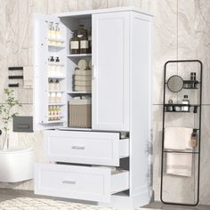 a white cabinet with drawers and shelves in a bathroom