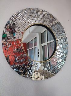 a mirror that is hanging on the wall