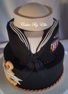 a cake made to look like a sailor's uniform on top of a hat